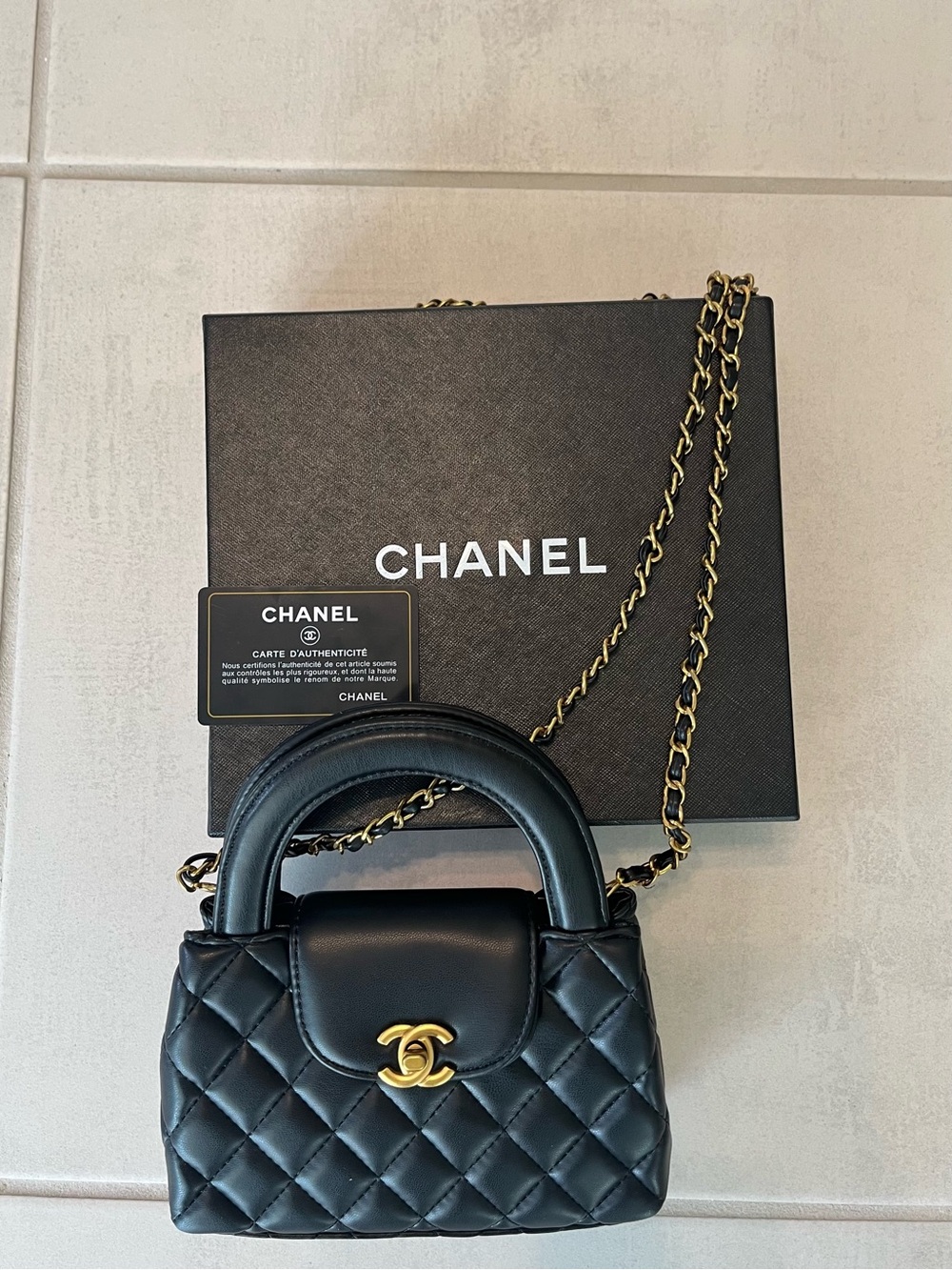 CHANEL Black Quilted Mini Top-Handle Bag with Gold Chain